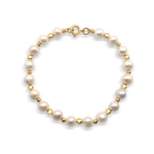 Beautiful natural pearls and 18 k gold plated bracelet handmade by Marie France Design
